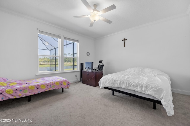 bedroom with crown molding, light colored carpet, and ceiling fan