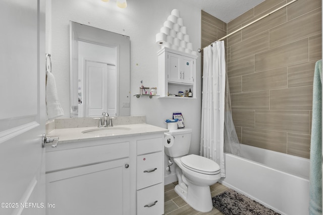 full bathroom featuring vanity, toilet, and shower / bath combo