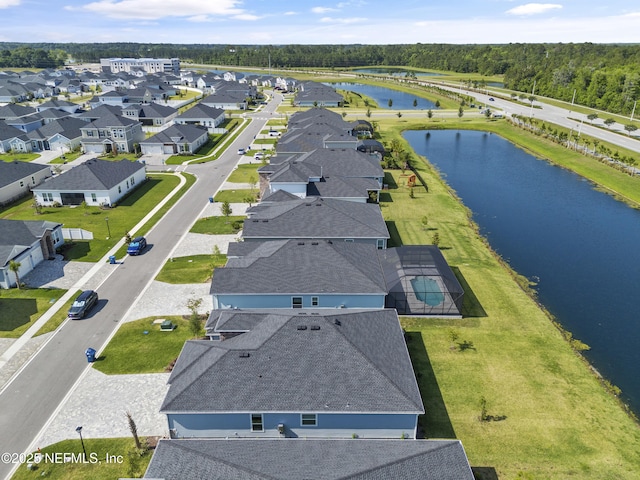 drone / aerial view featuring a water view