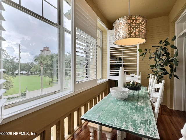 dining room with dark wood-type flooring