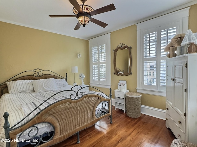 bedroom featuring wood-type flooring and ceiling fan