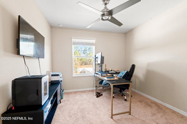 office featuring light colored carpet and ceiling fan