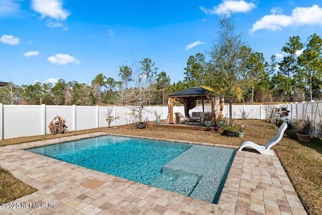 view of swimming pool with a gazebo and a patio