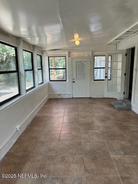 view of unfurnished sunroom