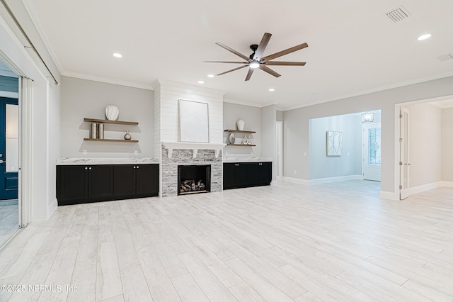 1351 Weaver Glen Rd, Jacksonville, FL 32223 - unfurnished living room with light wood-style floors, visible vents, and ornamental molding