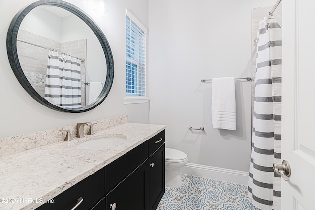 1351 Weaver Glen Rd, Jacksonville, FL 32223 - bathroom featuring toilet, vanity, baseboards, and tile patterned floors
