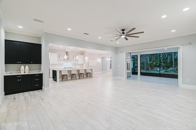 1351 Weaver Glen Rd, Jacksonville, FL 32223 - unfurnished living room with ceiling fan, light wood-type flooring, baseboards, and recessed lighting