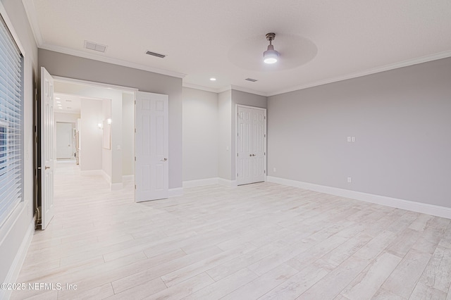 1351 Weaver Glen Rd, Jacksonville, FL 32223 - spare room featuring light wood-style floors, baseboards, and ornamental molding