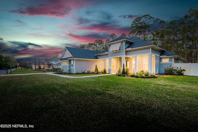 1351 Weaver Glen Rd, Jacksonville, FL 32223 - view of front of house featuring a shingled roof, fence, board and batten siding, and a front yard