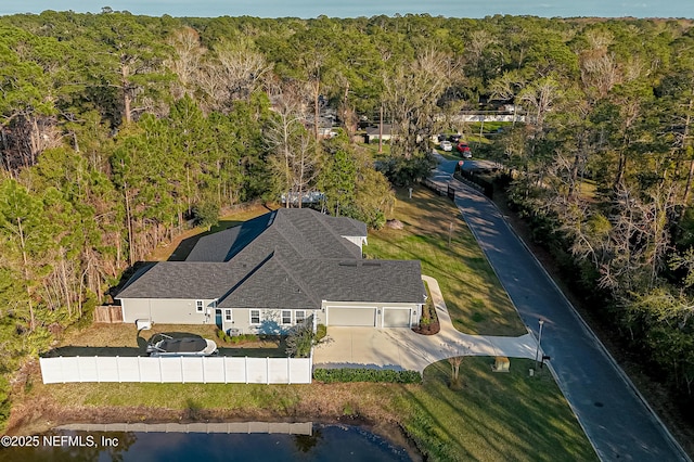 1351 Weaver Glen Rd, Jacksonville, FL 32223 - aerial view featuring a wooded view