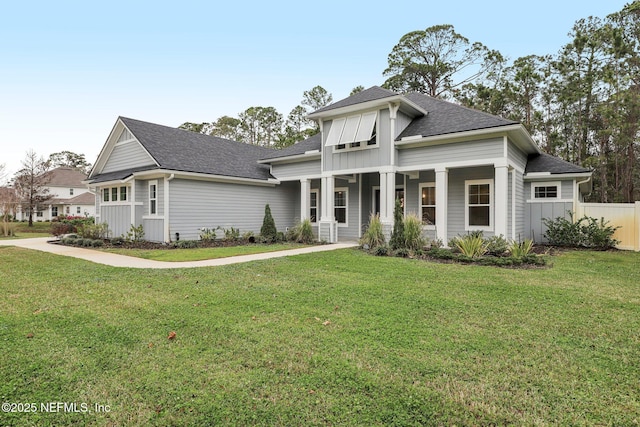 1351 Weaver Glen Rd, Jacksonville, FL 32223 - view of front of home with a porch, a front yard, and fence