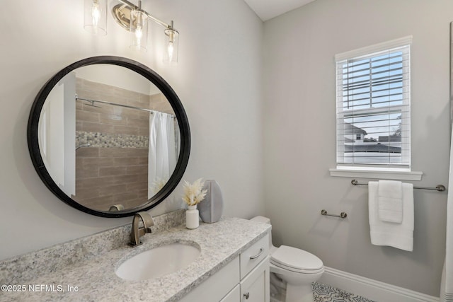 1351 Weaver Glen Rd, Jacksonville, FL 32223 - full bathroom with baseboards, a tile shower, vanity, and toilet