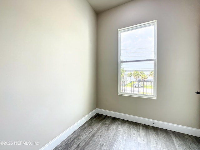 spare room featuring hardwood / wood-style floors