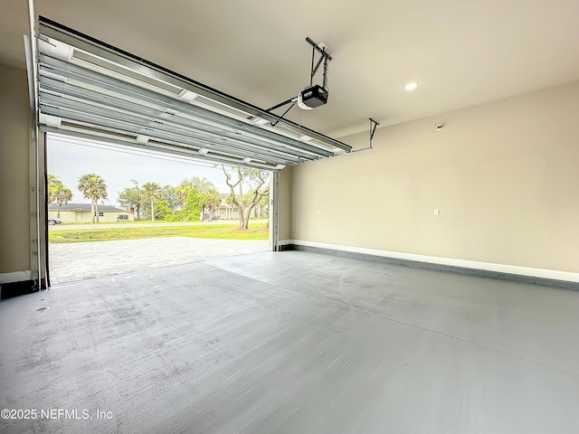 garage featuring a garage door opener