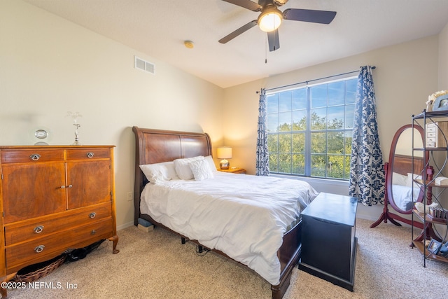 12700 Bartram Park Blvd Unit 2333, Jacksonville, FL 32258 - bedroom featuring baseboards, visible vents, a ceiling fan, and light colored carpet