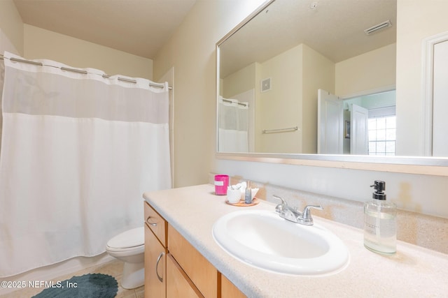 12700 Bartram Park Blvd Unit 2333, Jacksonville, FL 32258 - full bath with toilet, tile patterned flooring, vanity, and visible vents