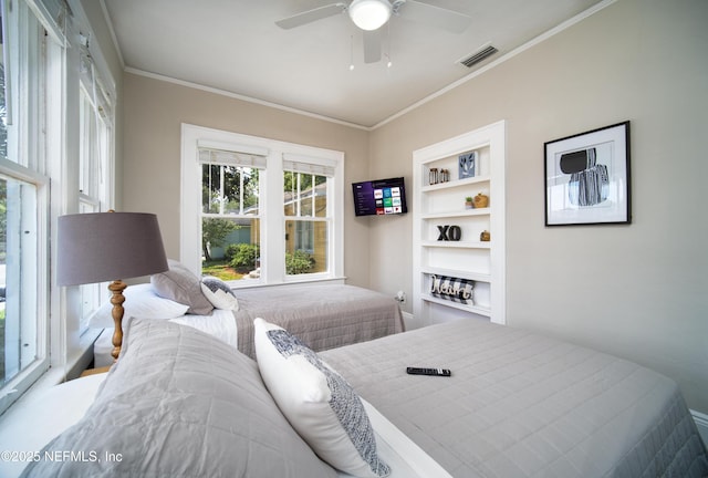 bedroom featuring ornamental molding, visible vents, and ceiling fan