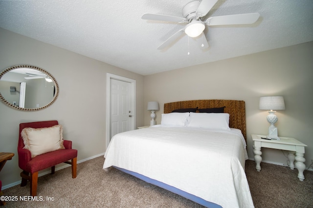 carpeted bedroom featuring a textured ceiling, a ceiling fan, and baseboards