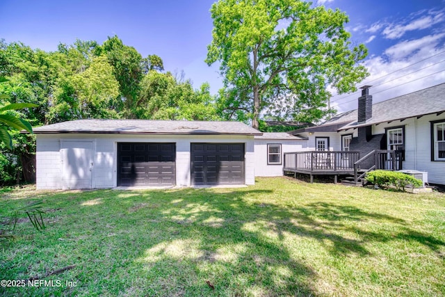 detached garage featuring cooling unit