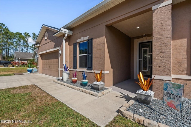 doorway to property featuring a garage