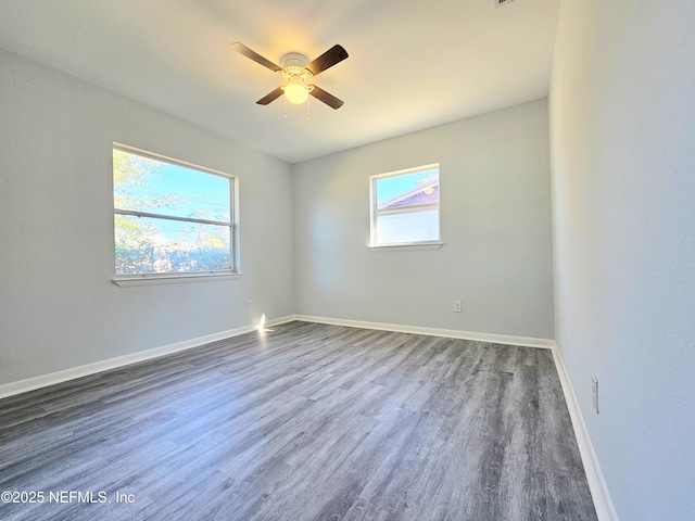 2434 Leonid Rd, Jacksonville, FL 32218 - unfurnished room with dark wood-type flooring and ceiling fan