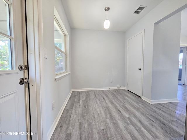 2434 Leonid Rd, Jacksonville, FL 32218 - interior space featuring a wealth of natural light and light hardwood / wood-style flooring
