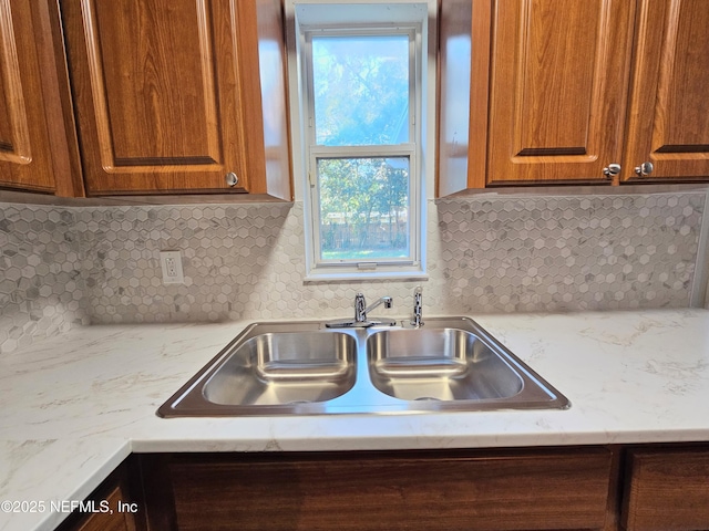 2434 Leonid Rd, Jacksonville, FL 32218 - kitchen featuring sink and decorative backsplash