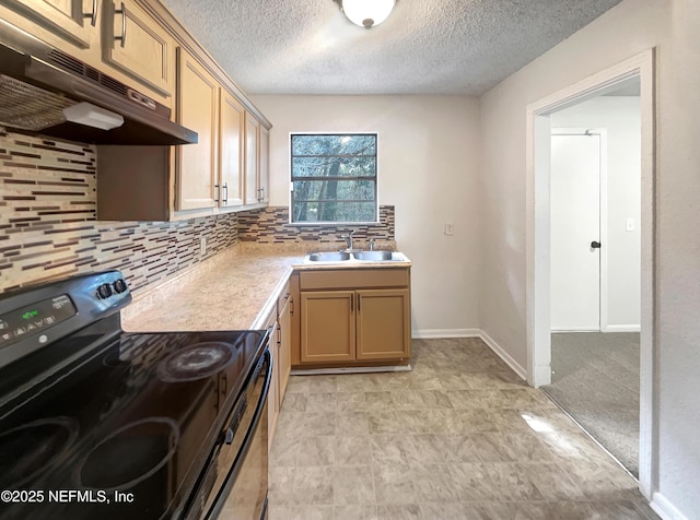 kitchen featuring light brown cabinetry, black range with electric stovetop, a textured ceiling, decorative backsplash, and sink