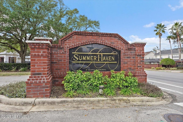 view of community sign