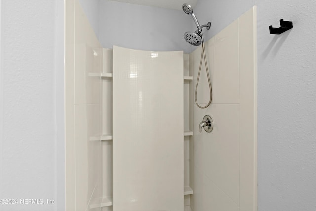 bathroom with a shower