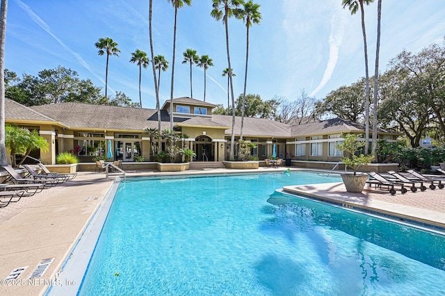 view of swimming pool featuring a patio area