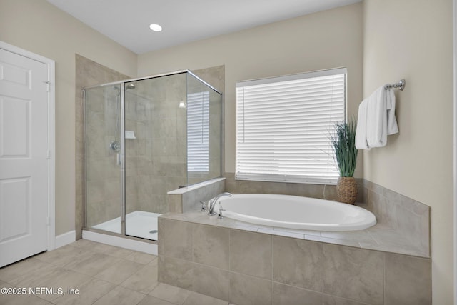 bathroom featuring shower with separate bathtub and tile patterned floors