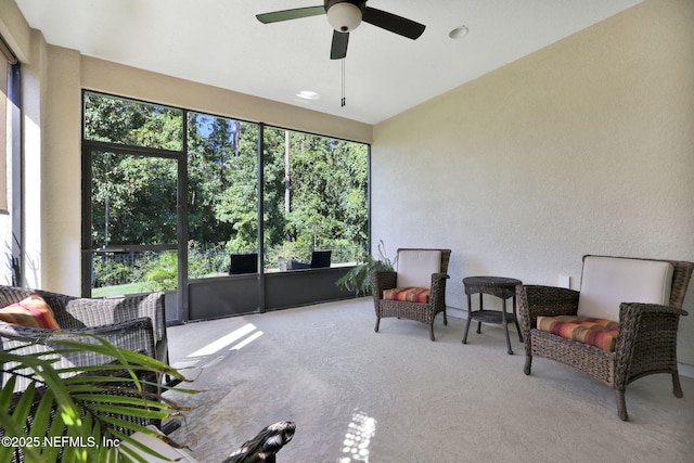 sunroom / solarium with ceiling fan