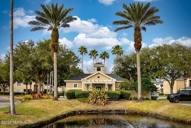 view of building exterior featuring a water view