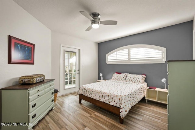 bedroom featuring ceiling fan and light hardwood / wood-style floors