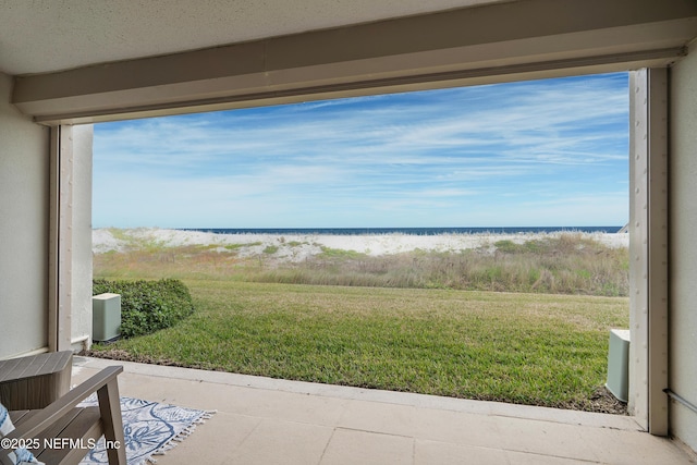 view of water feature with a beach view