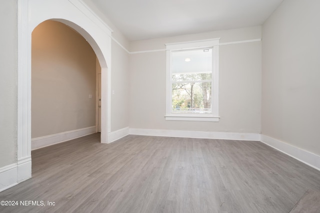 spare room with light hardwood / wood-style floors