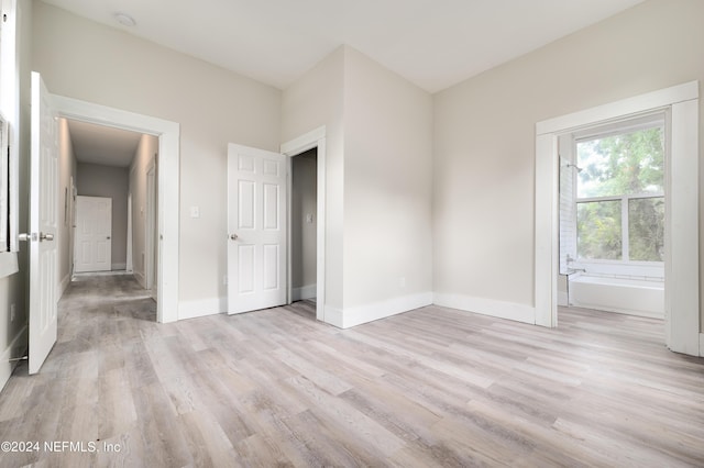 unfurnished bedroom featuring light hardwood / wood-style floors