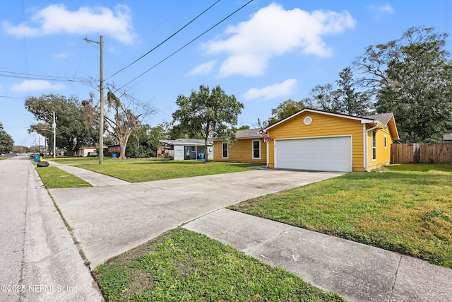 ranch-style house with a garage and a front yard