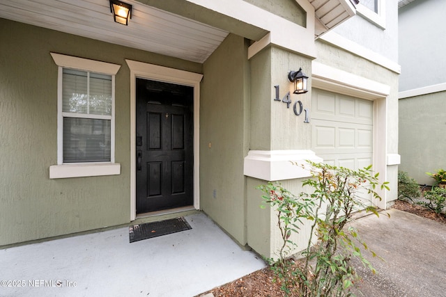 entrance to property with a garage