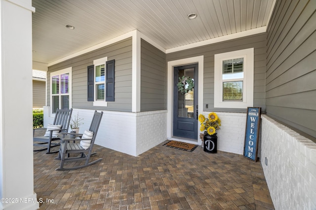 entrance to property with a porch