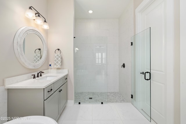 bathroom featuring vanity and walk in shower