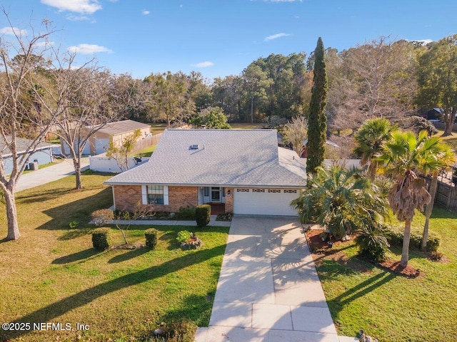 ranch-style home with a garage and a front lawn