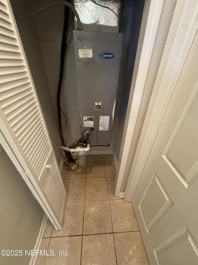 bathroom with tile patterned floors