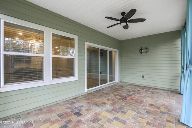 view of patio / terrace featuring ceiling fan