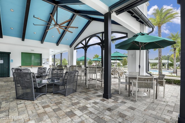 view of patio / terrace with a gazebo and an outdoor bar