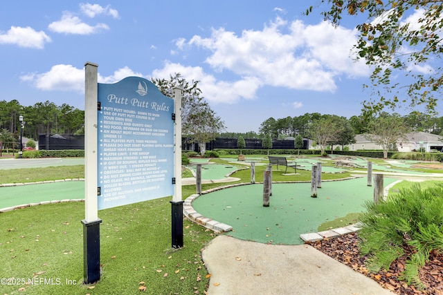 view of community featuring a lawn