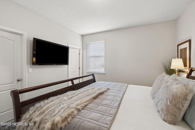 bedroom with a textured ceiling