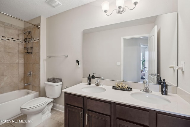 full bathroom featuring  shower combination, visible vents, a sink, and toilet