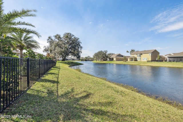 water view with fence and a residential view